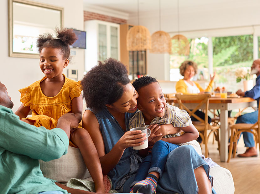 Multigenerational family relaxing at home